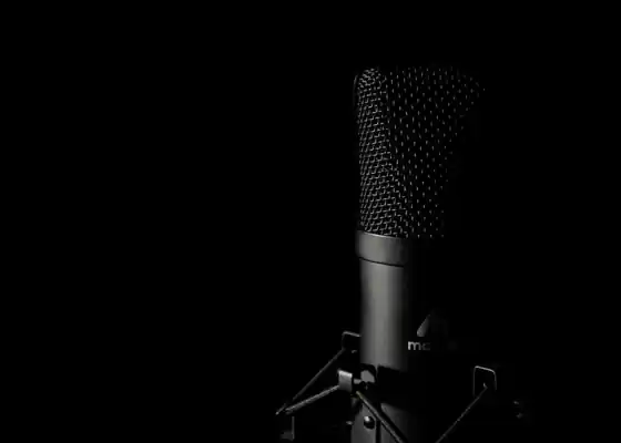 Singer recording in a calm Ubud studio surrounded by tropical greenery